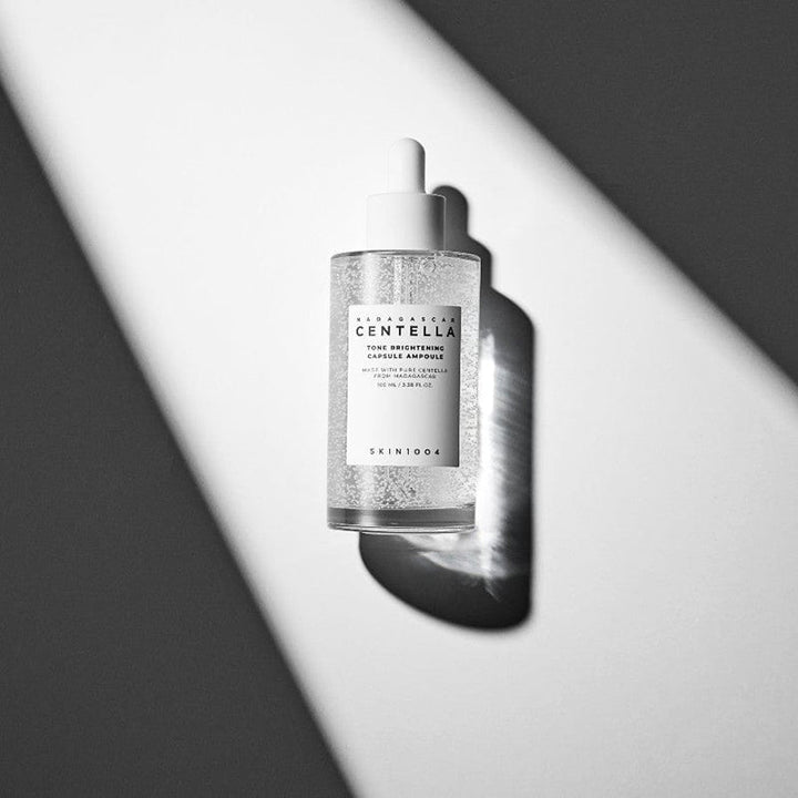 SKIN1004 Madagascar Centella Tone Brightening Capsule Ampoule — skin1004-ampoule-serum-100ml-madagascar-centella-tone-brightening-capsule-ampoule-36440330895606_900x900_4a08df94-20f8-451c-9a22-42a27ba4f765